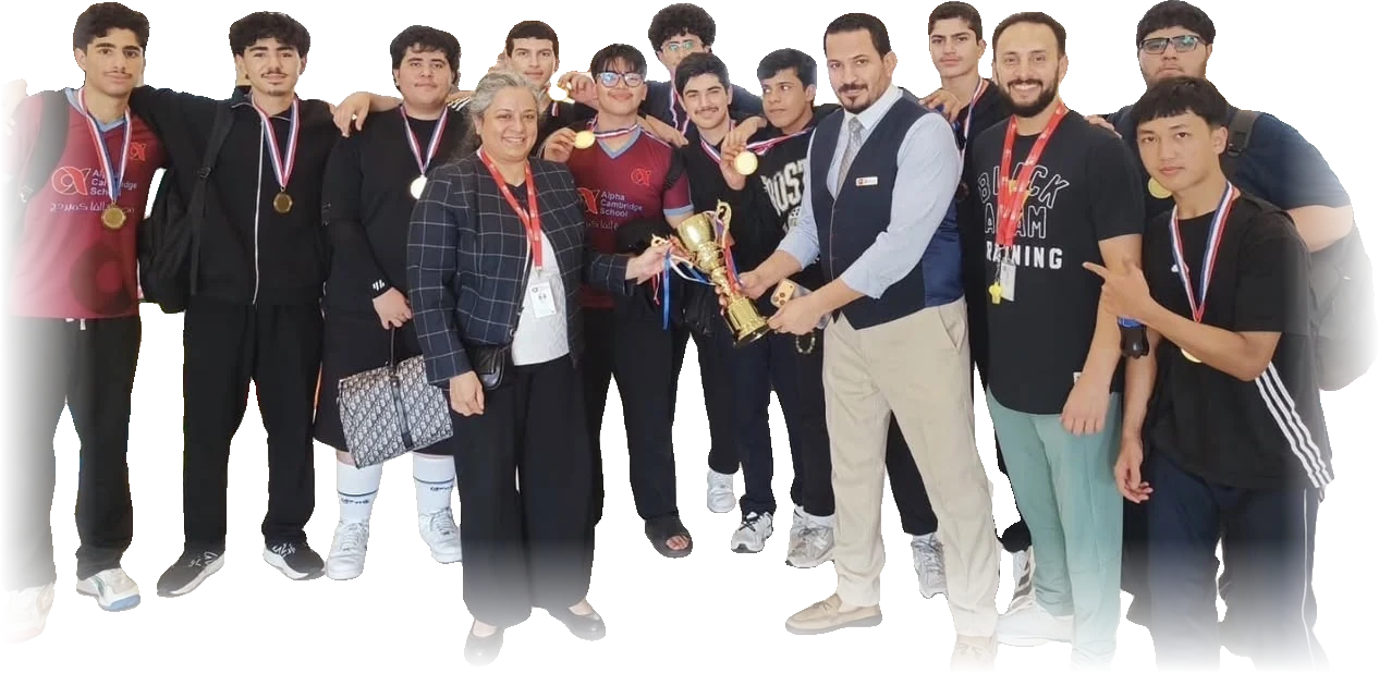 Alpha’s Volleyball team with their gold medals and the inter-Taleb trophy